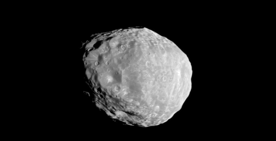 Janus as photographed by Cassini with craters not quite large enough to destroy it